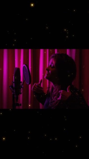 Karry performing in the studio